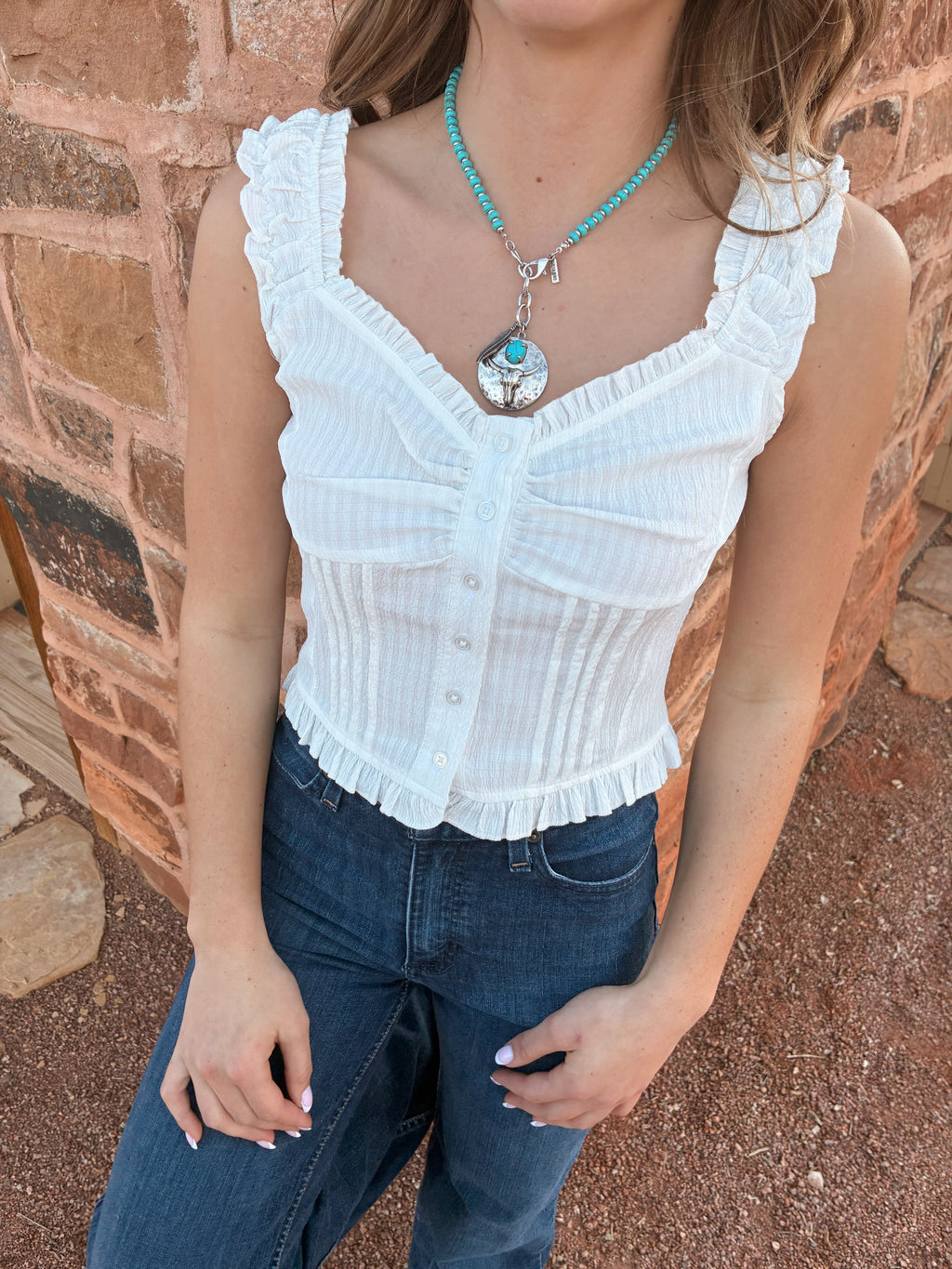 White ruffled cap sleeve button-front top from Nectar Clothing