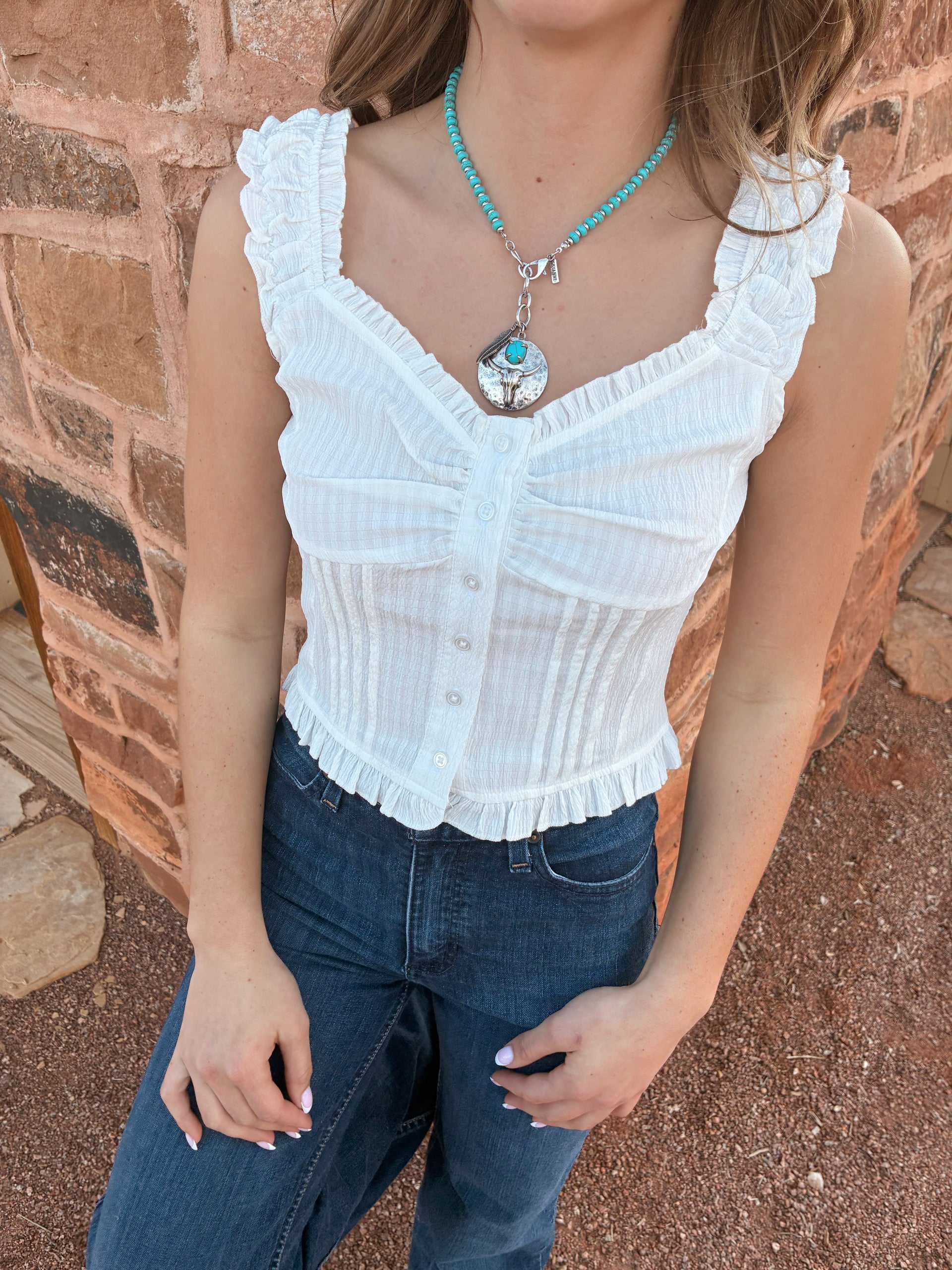 White ruffled cap sleeve button-front top from Nectar Clothing