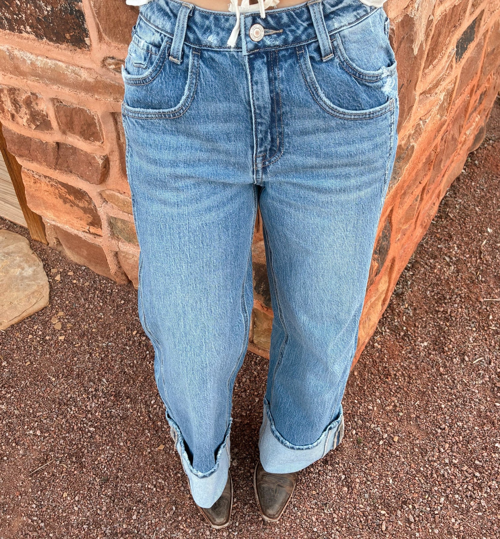 Dark wash mid-rise Kris from vervet baggy wide leg jeans with cuffed hem styled western 
