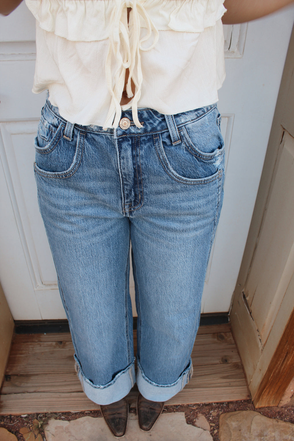 Dark wash mid-rise Kris from vervet baggy wide leg jeans with cuffed hem styled western 