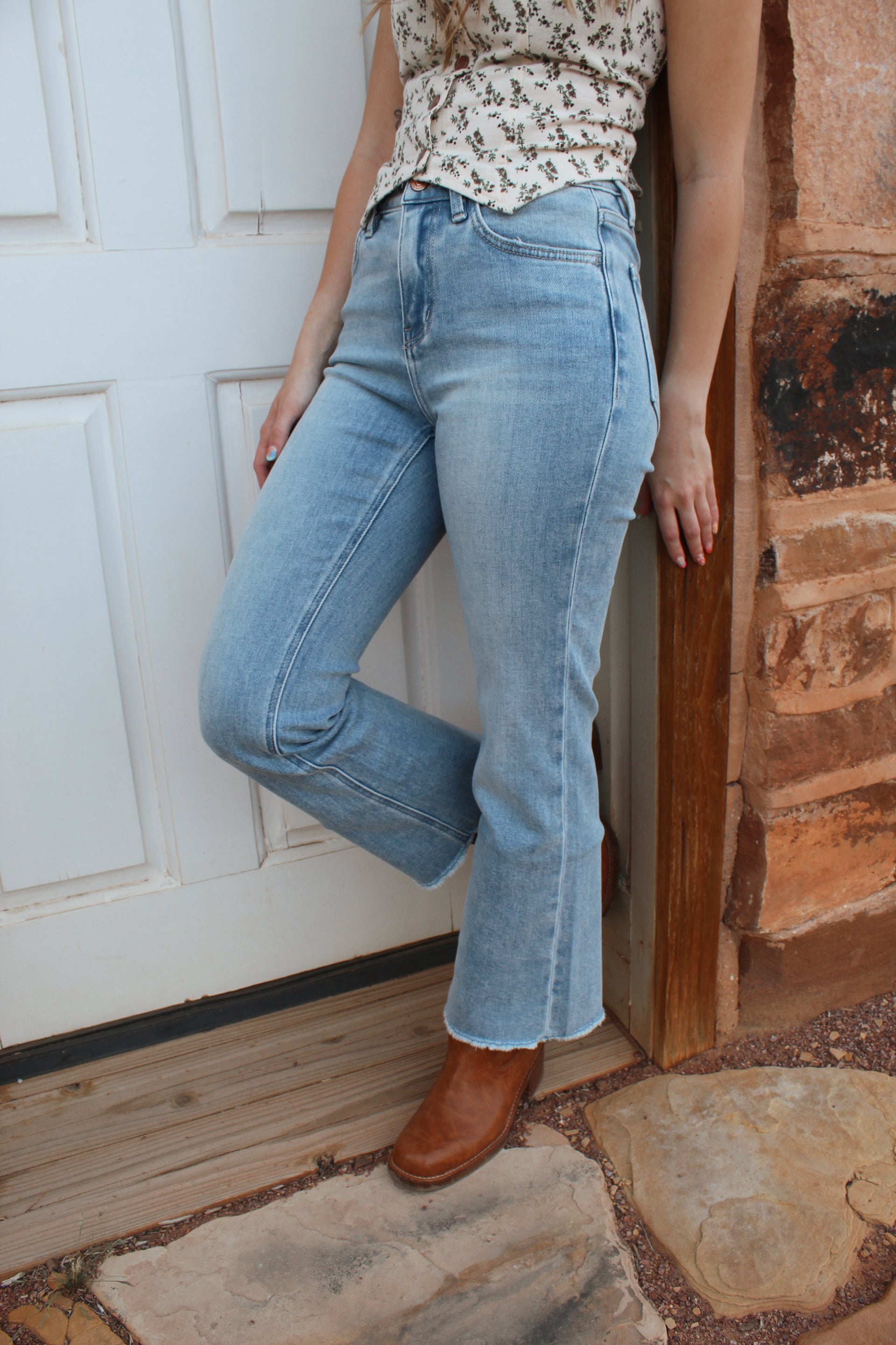 Flying Monkey high rise light wash kick flare jeans with cropped raw hem 