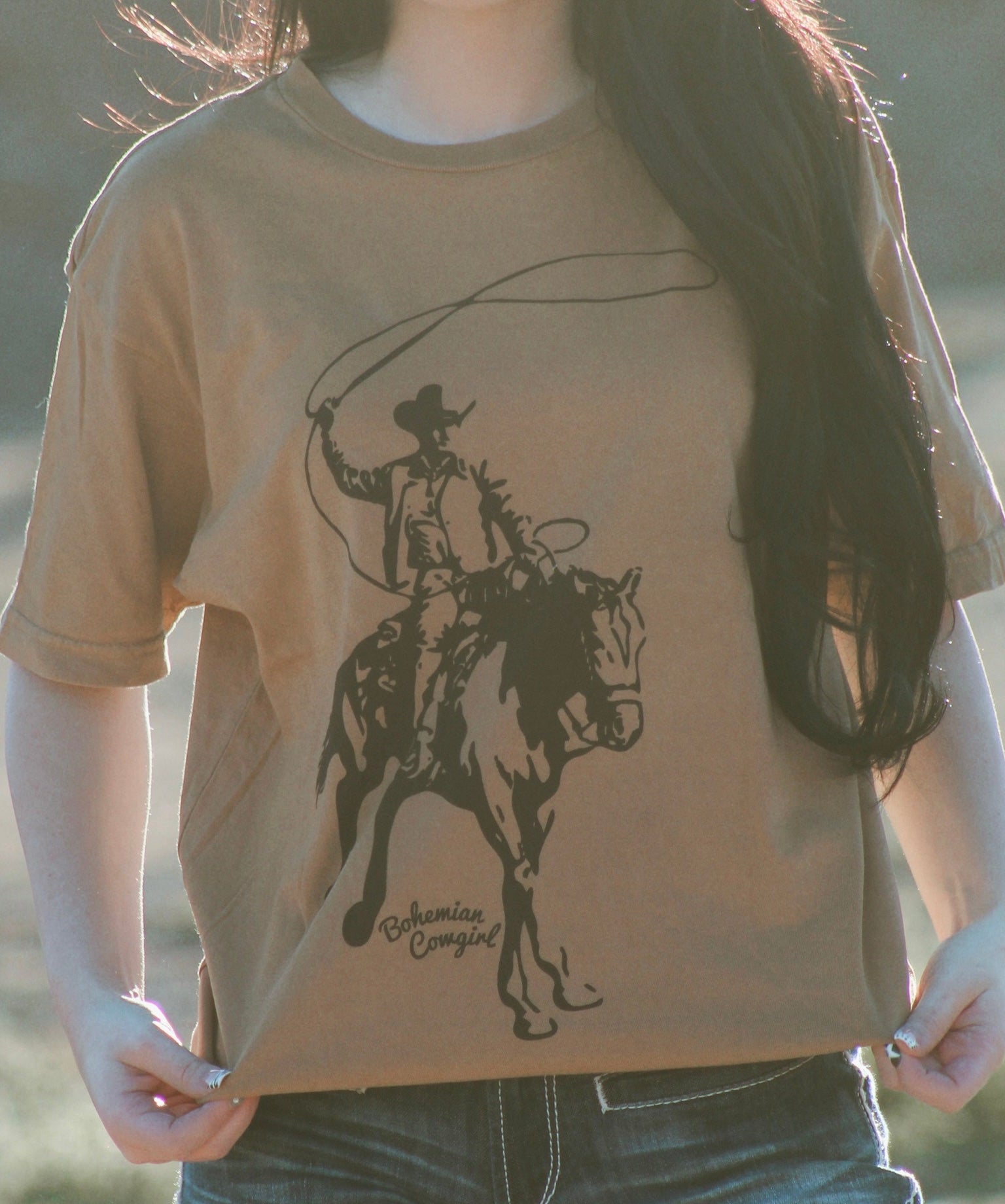 Bohemian Cowgirl western roper graphic tee with cowboy lasso design for women